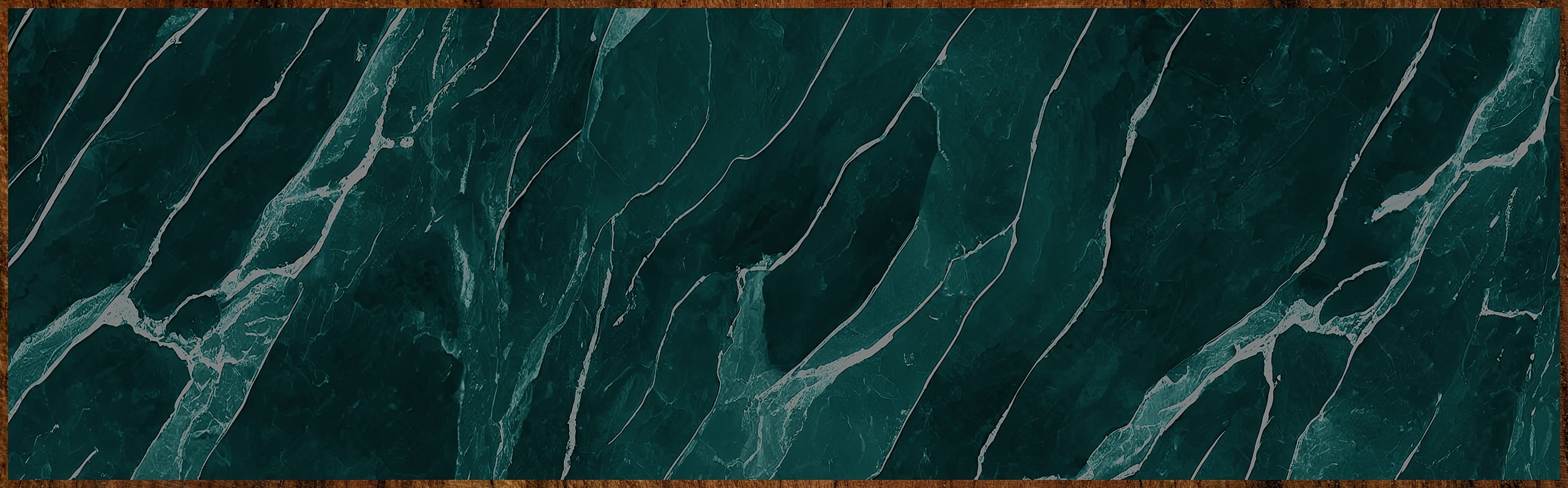 Abstract dark green marble texture with white veins.