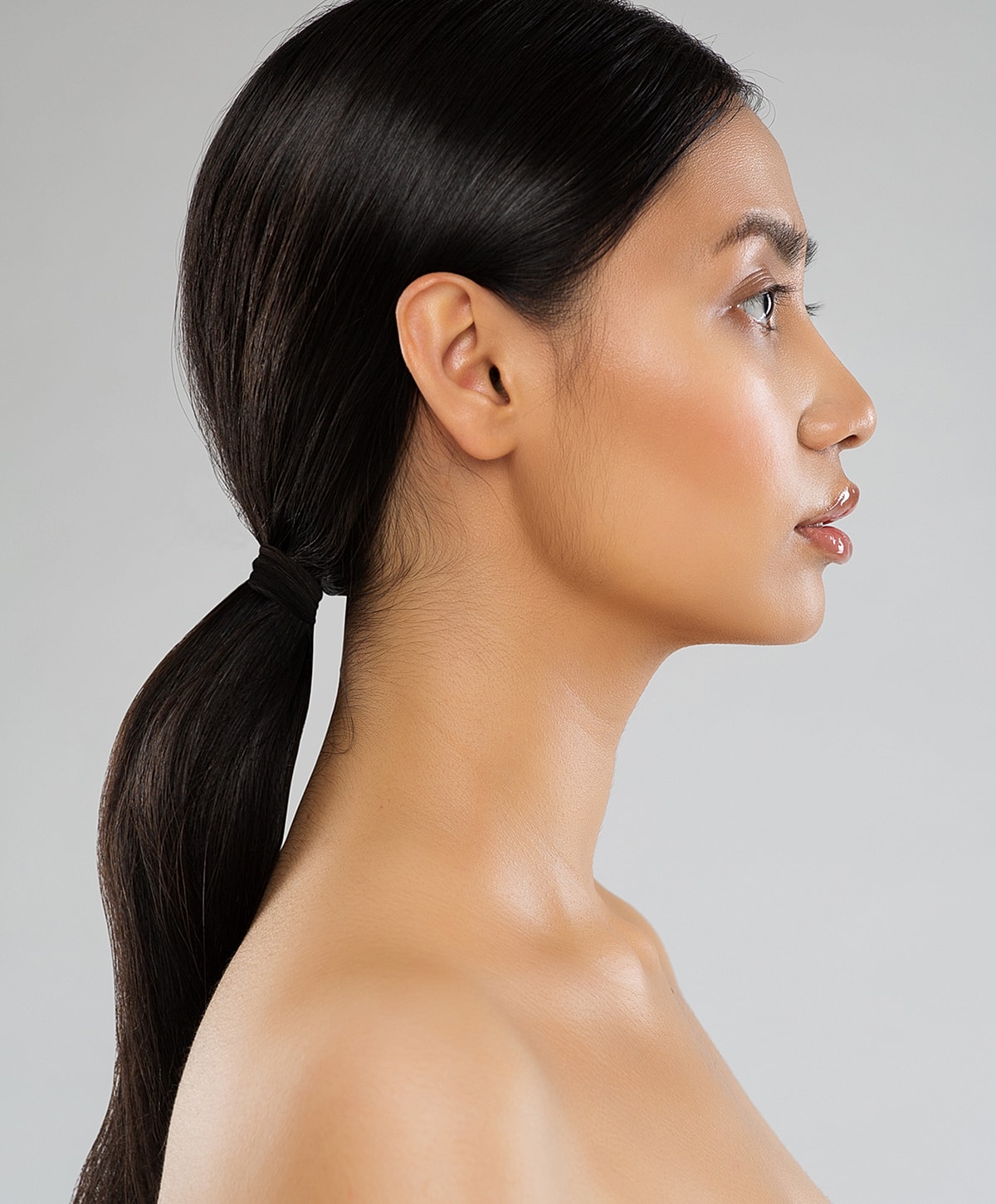 Close-up of a woman with soft makeup.