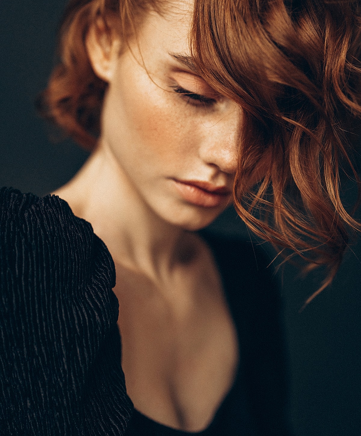 Close-up of a woman with soft makeup.
