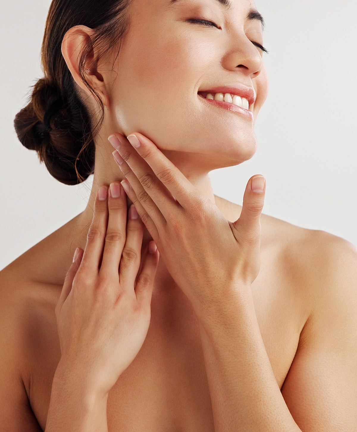 Close-up of a woman with soft makeup.