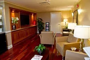 Cozy, modern living room with wooden accents.